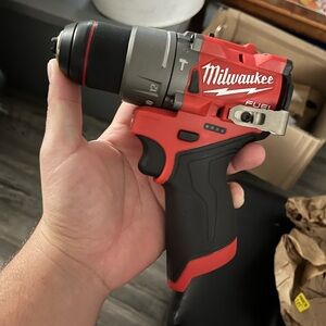 Milwaukee Red and Black Cordless Drill m 12 hammer drill